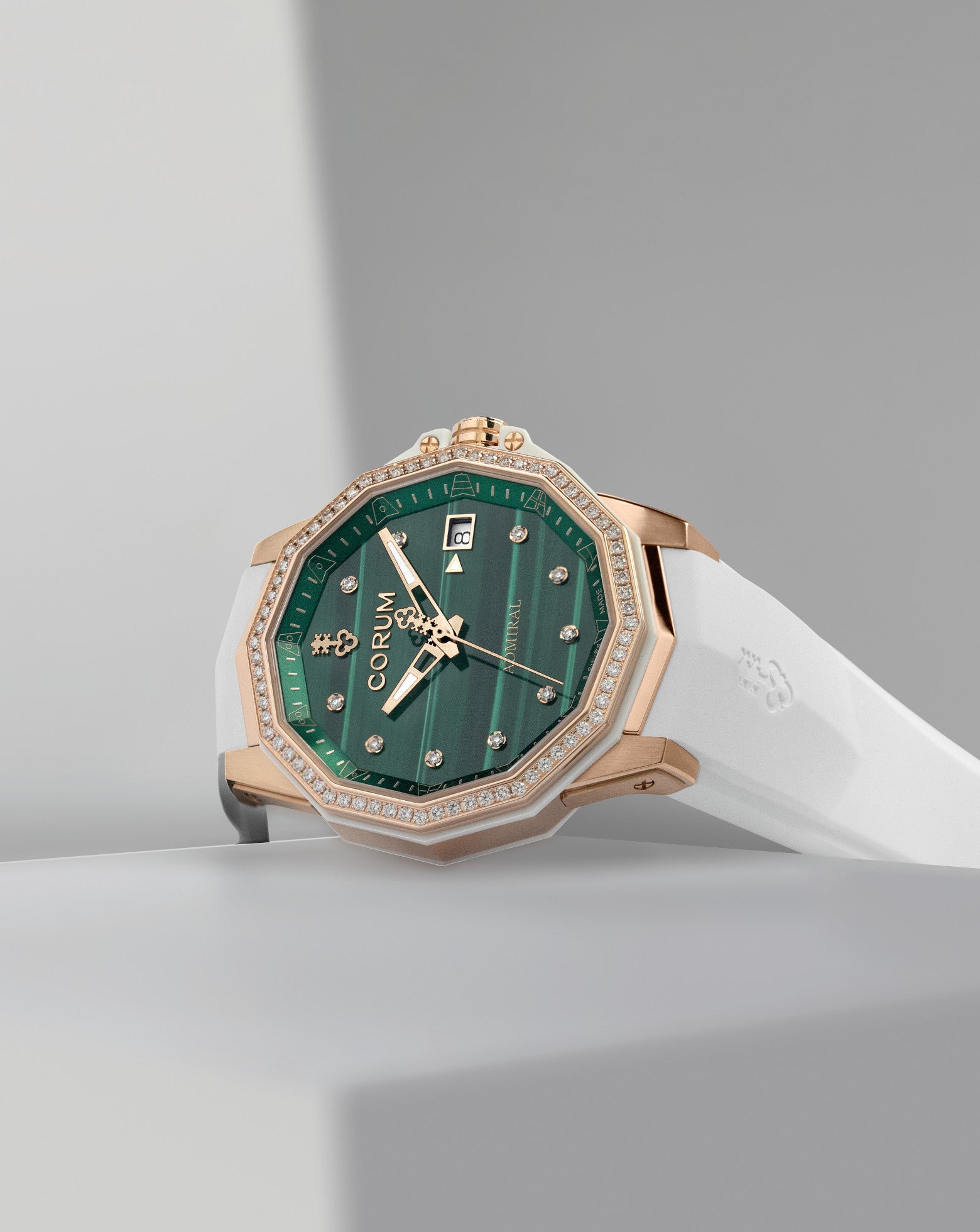Corum Admiral 38 Automatic, Green Malachite Dial With 10 Diamonds, 18K Rose Gold Case, 72 Round Diamonds On Bezel, White Rubber Strap 18K Rose Gold Triple Folding Clasp